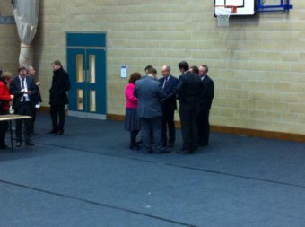 Candidates and agents in a huddle around the area returning officer before the final declaration. Source: Twitter/@sazradio.